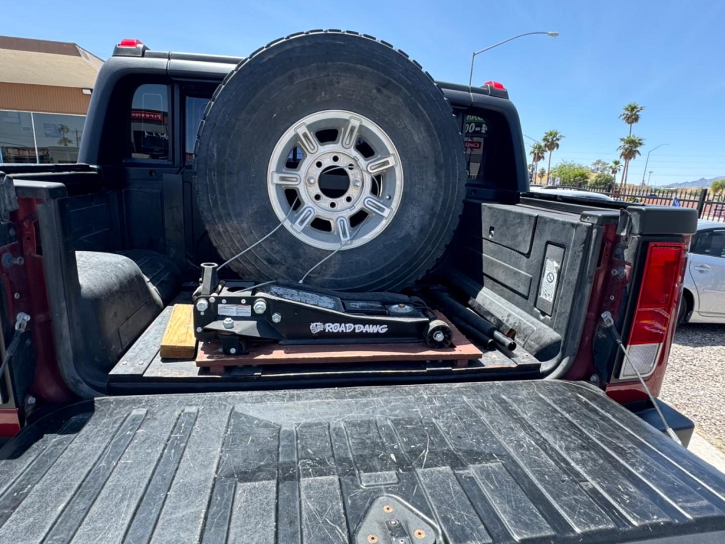 2005 Red /black Hummer H2 SUT , located at 2190 Hwy 95, Bullhead City, AZ, 86442, (928) 704-0060, 0.000000, 0.000000 - 2005 Hummer H2 SUT. only 92k miles. 6.0 V8 4 wheel drive. New transmission with warranty. New shocks. lots of extras .onstar. backup camera, custom stereo. fabtech 6 in lift with 40 in tires. Big Bad Hummer. $22900. Free and clear title. - Photo#9